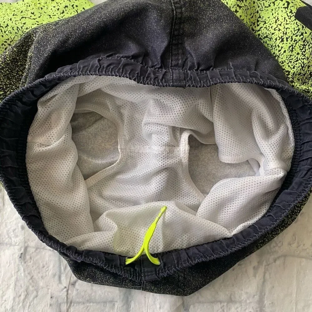 Under Armour youth M lined swim shorts w/drawstring waist yellow & black